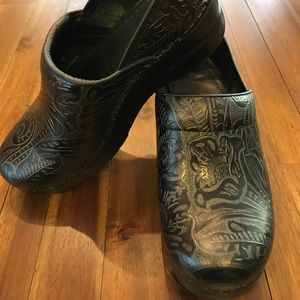 Dansko tooled leather clogs